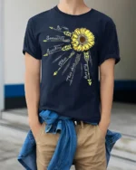Sunshine Quote T-Shirt with Arrows and Sunflower Art - model wearing navy shirt, hands in pockets