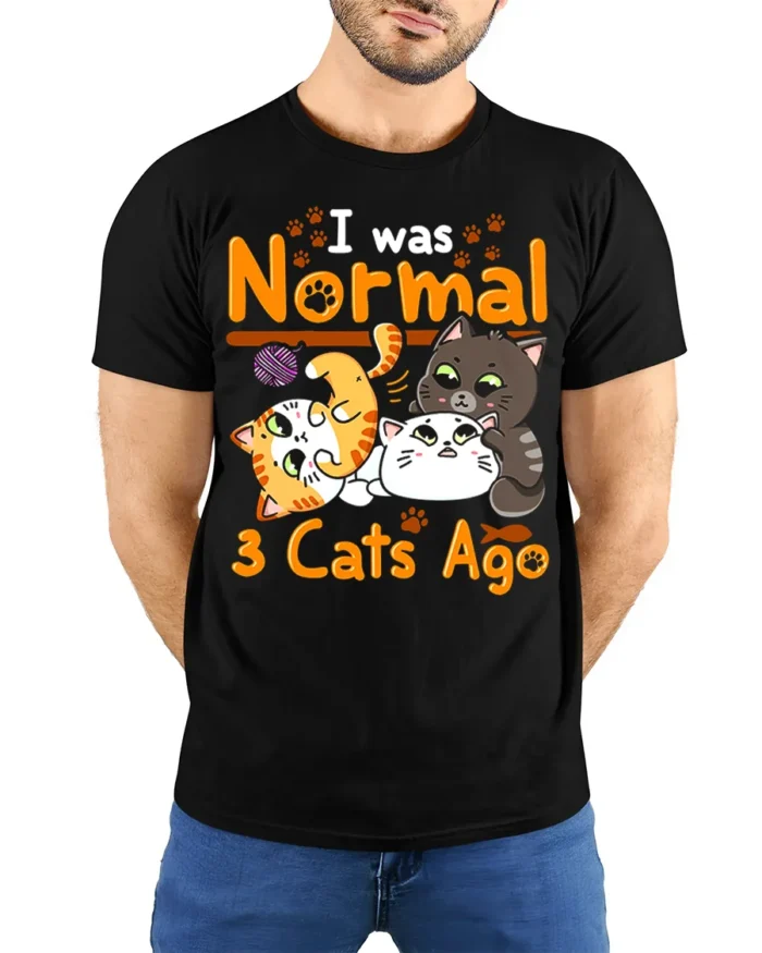 I Was Normal 3 Cats Ago Funny Cat Lover T-Shirt - model wearing black shirt, hands behind back