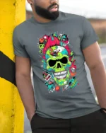 Neon Skull Explosion T-Shirt Colorful Punk Horror Tee - model in grey shirt leaning against column