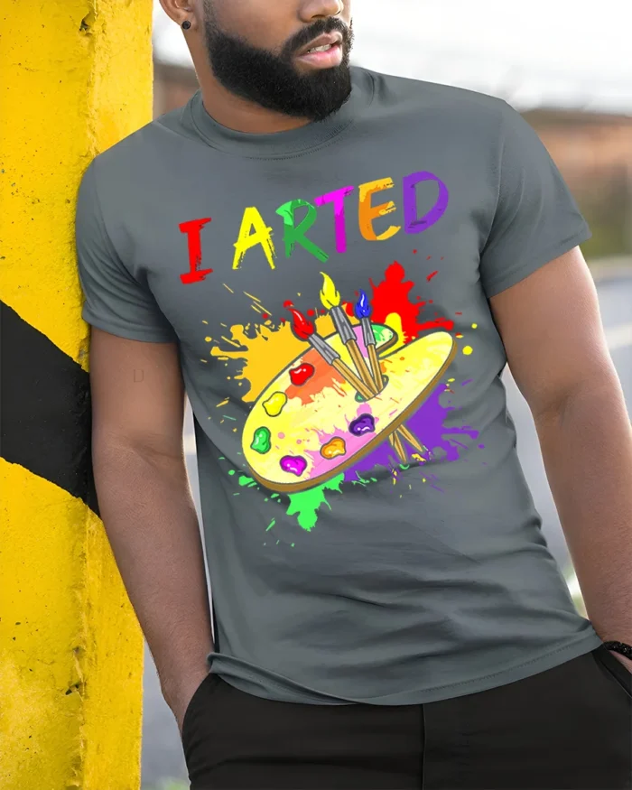 Artistic Humor T-Shirt I ARTED Paint Palette Shirt - model in grey shirt leaning against column