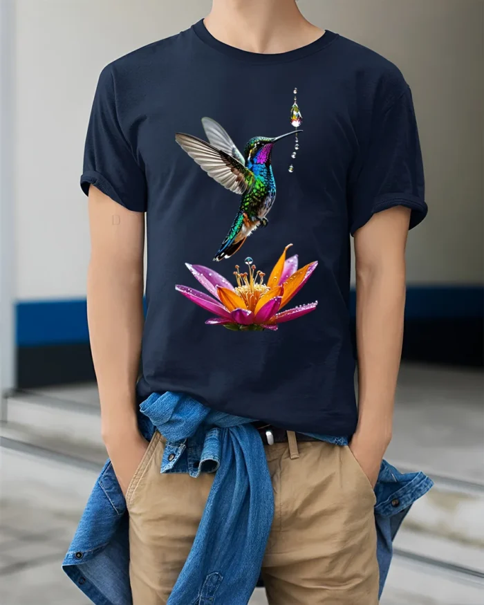 Colorful Hummingbird and Flower T-Shirt Nature Art Tee - model wearing navy shirt, hands in pockets