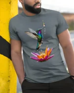 Colorful Hummingbird and Flower T-Shirt Nature Art Tee - model in grey shirt leaning against column