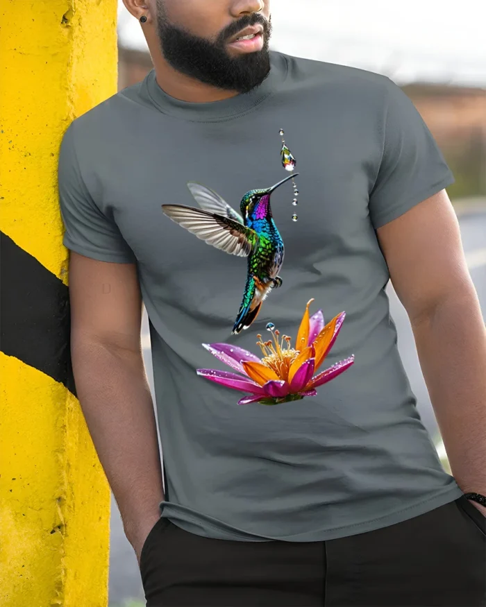 Colorful Hummingbird and Flower T-Shirt Nature Art Tee - model in grey shirt leaning against column