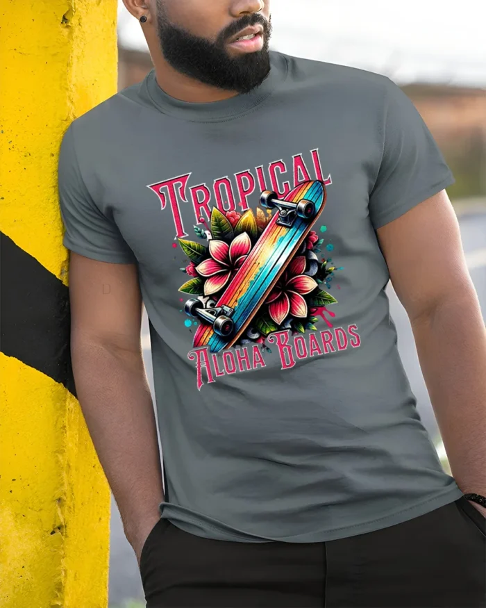 Tropical Skateboard T-Shirt Aloha Beach Style Tee - model in grey shirt leaning against column