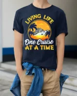 Cruise Life T-Shirt Living Life One Cruise at a Time Tee - model wearing navy shirt, hands in pockets