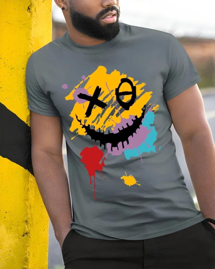 Abstract Smiley Face T-Shirt Color Splash Streetwear Tee - model in grey shirt leaning against column