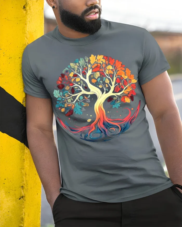 Colorful Tree of Life T-Shirt Vibrant Nature Graphic Tee - model in grey shirt leaning against column