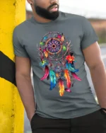 Boho Dreamcatcher T-Shirt Vibrant Native-Inspired Tee - model in grey shirt leaning against column