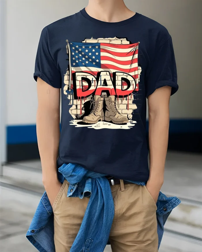 USA Flag Dad T-Shirt with Combat Boots Veteran Tribute - model wearing navy shirt, hands in pockets