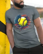 Patriotic Softball Graphic Tee 4th of July T-Shirt - model in grey shirt leaning against column