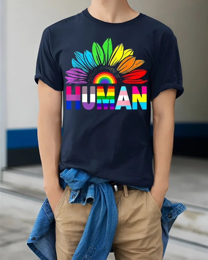 Colorful Human Rights T-Shirt Pride Flower Graphic - model wearing navy shirt, hands in pockets