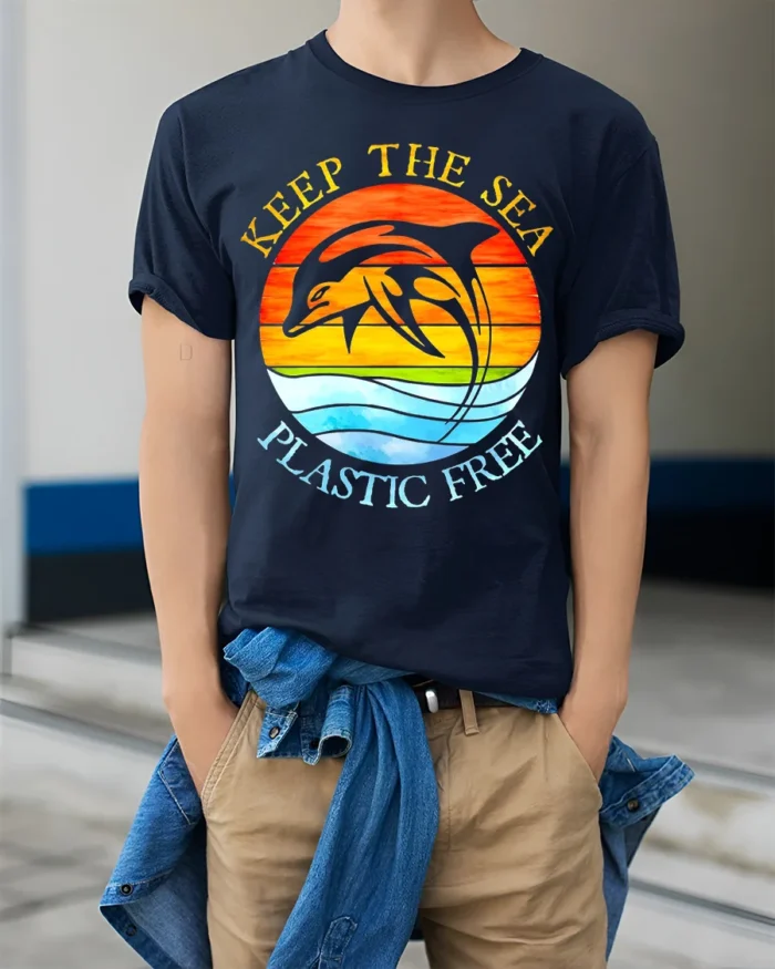 Keep The Sea Plastic Free Dolphin T-Shirt Eco Graphic - model wearing navy shirt, hands in pockets