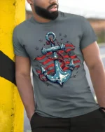 USA Anchor Flag Graphic T-Shirt 4th of July Style - model in grey shirt leaning against column
