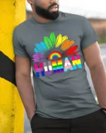Colorful Human Rights T-Shirt Pride Flower Graphic - model in grey shirt leaning against column