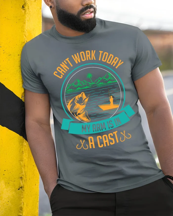 Funny Fishing T-Shirt My Arm Is in a Cast Graphic - model in grey shirt leaning against column