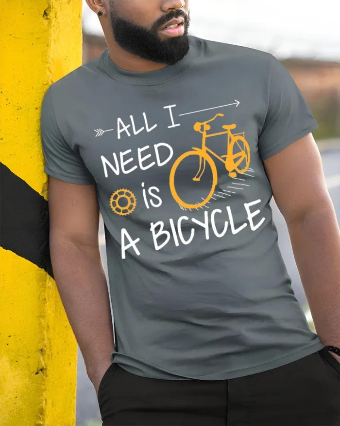 All I Need Is A Bicycle T-Shirt Casual Bike Rider - model in grey shirt leaning against column