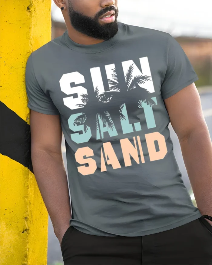 Sun Salt Sand T-Shirt Retro Summer Beach Vibe Tee - model in grey shirt leaning against column