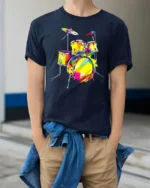 Colorful Drum Kit T-Shirt for Music Lovers and Drummers - model wearing navy shirt, hands in pockets
