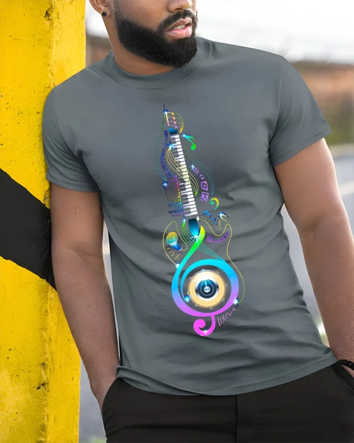 Colorful Music Lover T-Shirt Piano Treble Clef Design - model in grey shirt leaning against column