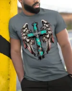 Rustic Angel Wings Cross T-Shirt Christian Faith - model in grey shirt leaning against column