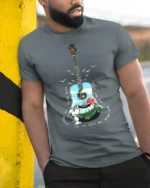 Snoopy Guitar Forest T-Shirt Nature Music Lover Tee - model in grey shirt leaning against column