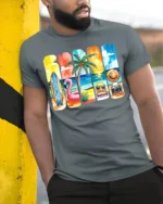 Colorful Summer Beach Vibes T-Shirt Fun Tropical Print - model in grey shirt leaning against column