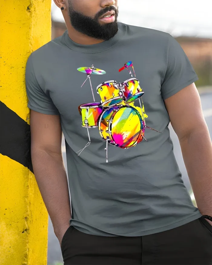 Colorful Drum Kit T-Shirt for Music Lovers and Drummers - model in grey shirt leaning against column