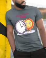 Daylight Saving Time Funny Sun T-Shirt Comfy Cotton - model in grey shirt leaning against column