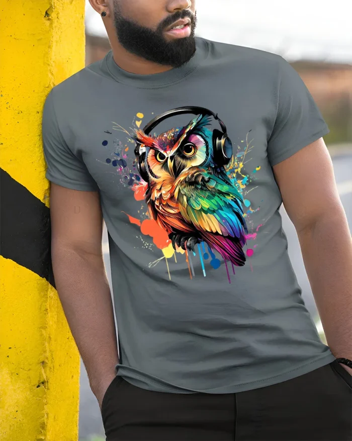 DJ Owl T-Shirt Colorful Headphones Bird for Music Fans - model in grey shirt leaning against column