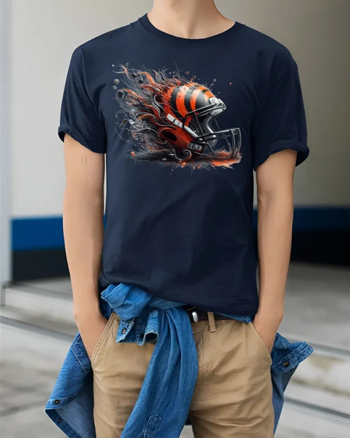 Fierce Football Helmet Flame T-Shirt Dynamic Art - model wearing navy shirt, hands in pockets