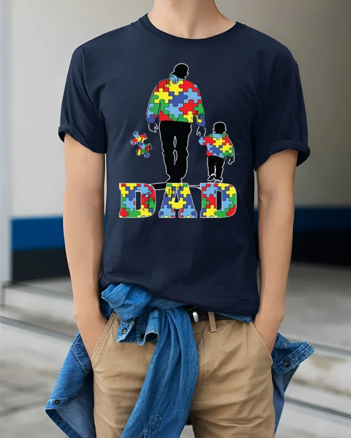 Father and Child Puzzle T-Shirt Colorful Dad - model wearing navy shirt, hands in pockets
