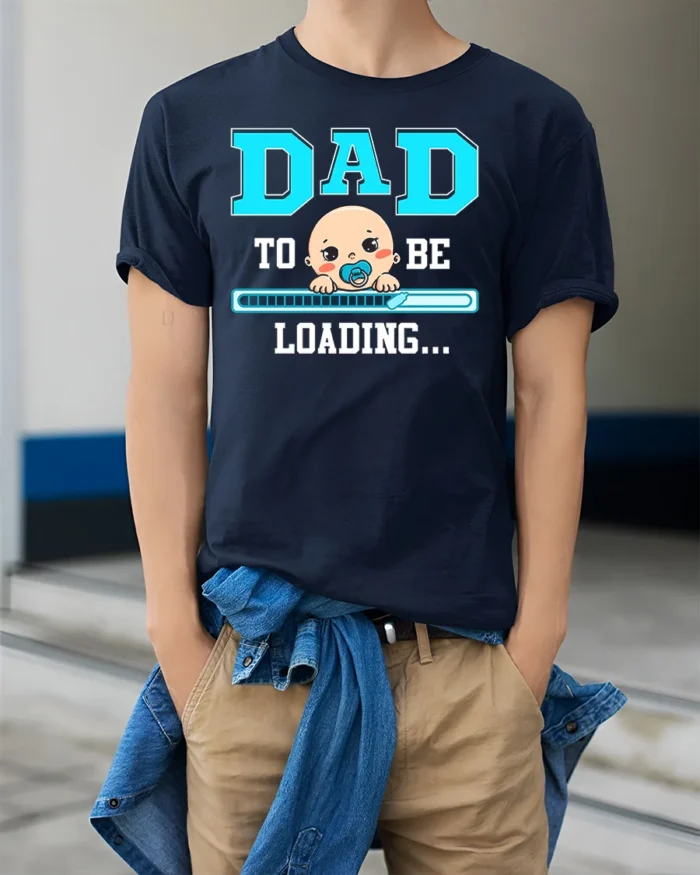 Dad To Be Loading Funny Pregnancy T-Shirt - model wearing navy shirt, hands in pockets