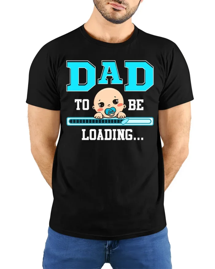 Dad To Be Loading Funny Pregnancy T-Shirt - model wearing black shirt, hands behind back