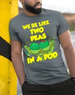 Cute Friendship Peas Graphic Tee Best Friends - model in grey shirt leaning against column