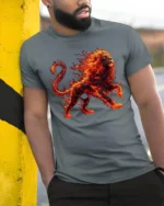 Blazing Lion Art Tee, Powerful Animal Graphic T-Shirt - model in grey shirt leaning against column