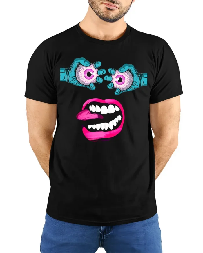 Surreal Monster Face Tee Trippy Eyeball Mouth Graphic - model wearing black shirt, hands behind back