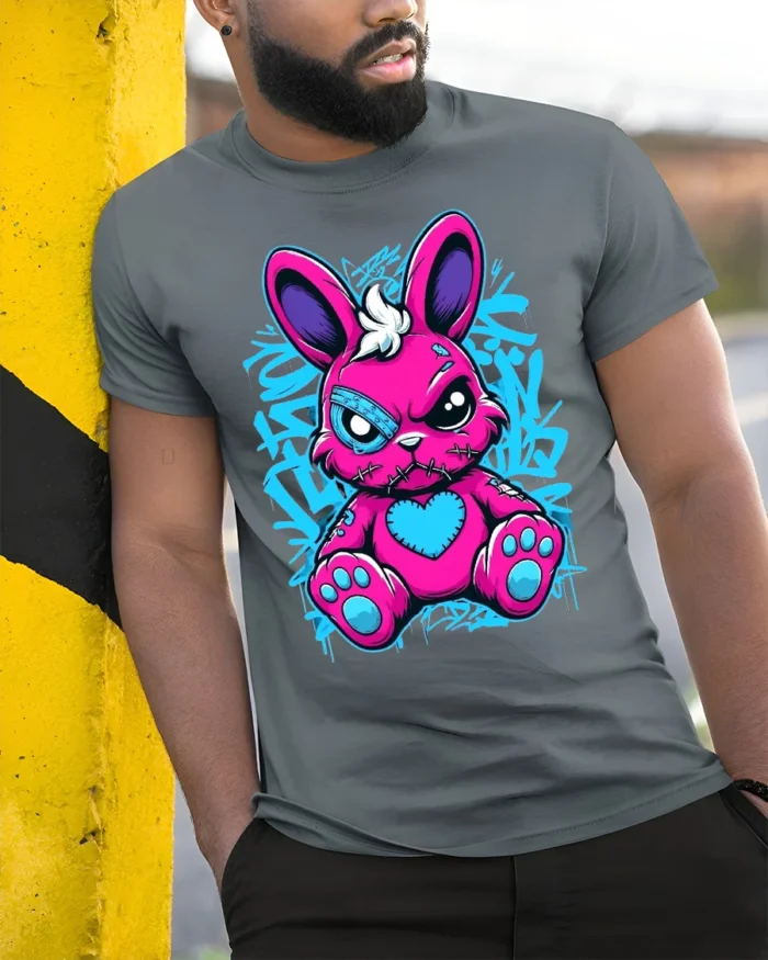 Edgy Pink Rabbit Tee with Heart and Graffiti Style Print - model in grey shirt leaning against column