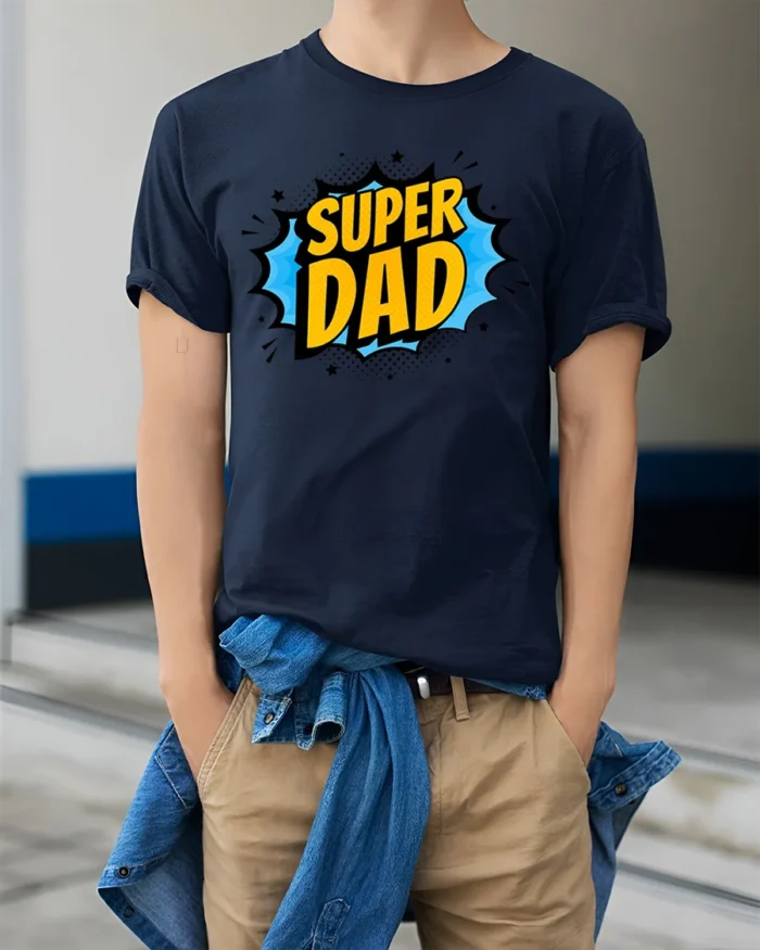 Superhero Dad T-Shirt Funny Father’s Day Tee Now - model wearing navy shirt, hands in pockets