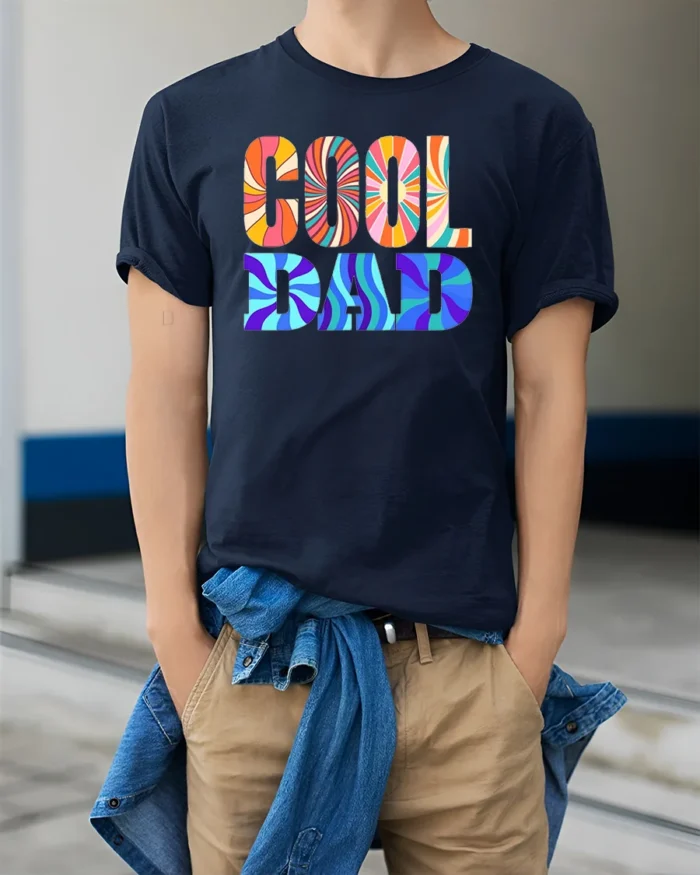 Retro Cool Dad Groovy Father’s Day T-Shirt Gift - model wearing navy shirt, hands in pockets