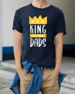 King of Dads Best Dad Crown Graphic T-Shirt Gift - model wearing navy shirt, hands in pockets