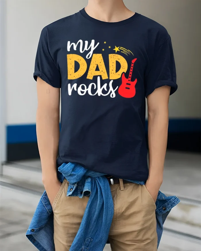 My Dad Rocks Cool Guitar Dad T-Shirt Gift - model wearing navy shirt, hands in pockets