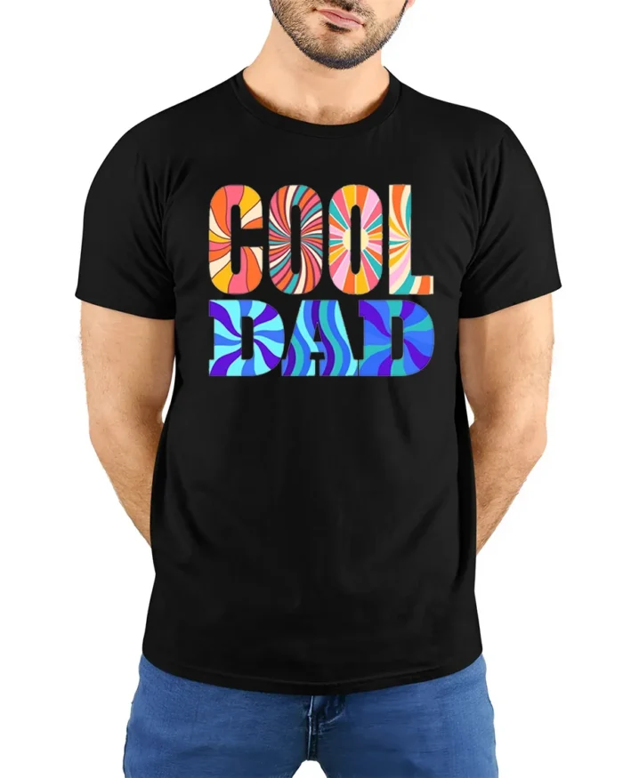 Retro Cool Dad Groovy Father’s Day T-Shirt Gift - model wearing black shirt, hands behind back