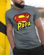Papa Superman T-Shirt Funny Father’s Day Hero - model in grey shirt leaning against column