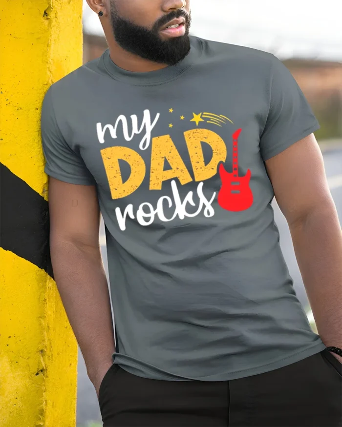 My Dad Rocks Cool Guitar Dad T-Shirt Gift - model in grey shirt leaning against column