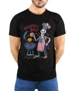 Skeleton BBQ T-Shirt Funny 4th of July Grill Tee - model wearing black shirt, hands behind back
