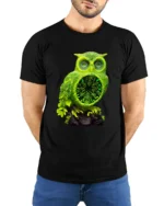Electric Owl Vibrant Green Forest Bird Shirt - model wearing black shirt, hands behind back