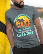 Father Like A Tree Strong Dad Family T-Shirt - model in grey shirt leaning against column