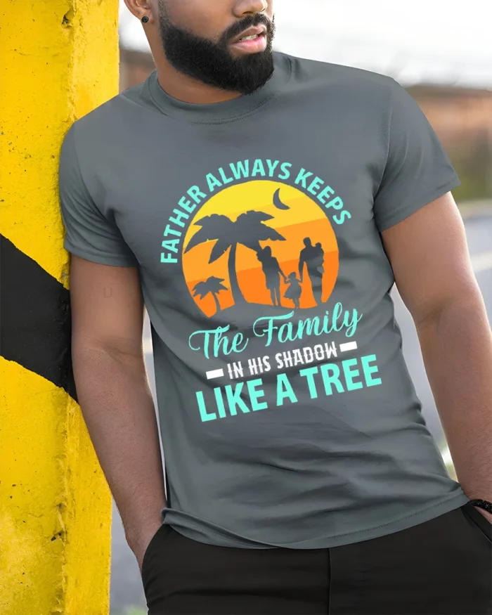 Father Like A Tree Strong Dad Family T-Shirt - model in grey shirt leaning against column
