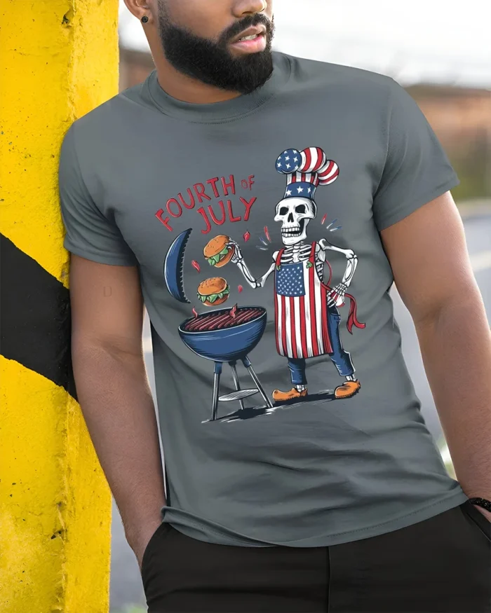 Skeleton BBQ T-Shirt Funny 4th of July Grill Tee - model in grey shirt leaning against column