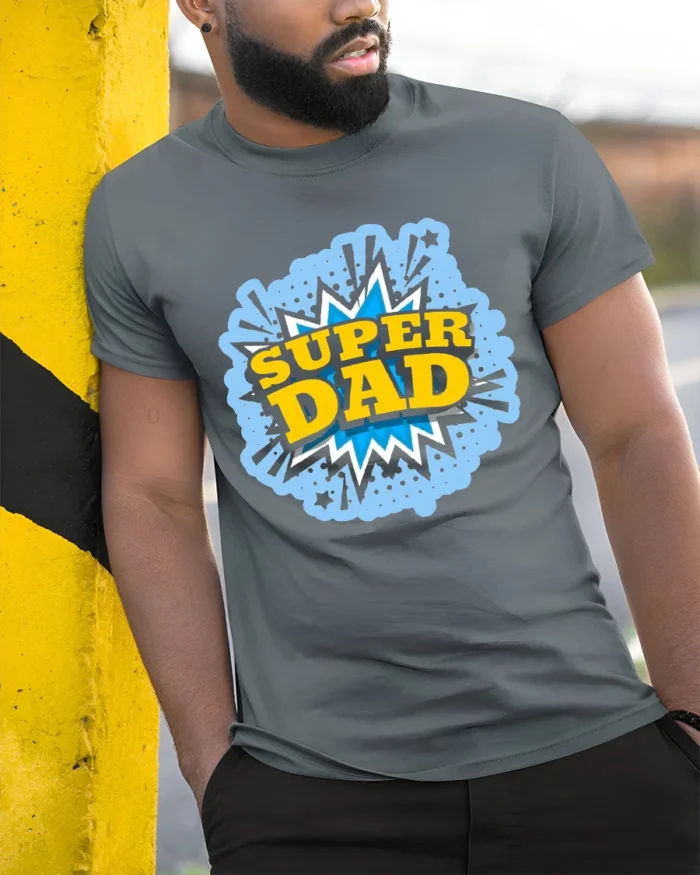 Super Dad Comic Hero Father’s Day T-Shirt - model in grey shirt leaning against column